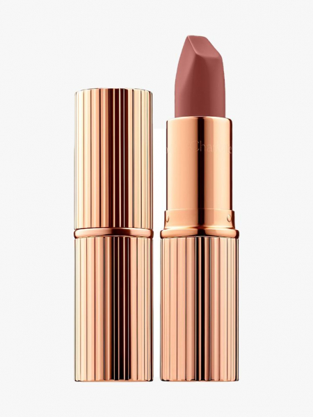Charlotte Tilbury Matte Revolution Lipstick in Pillow Talk rose gold tube ridged of nude pink lipstick on light gray background