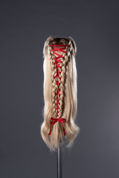 close up of margot robbie's corset braids wig from wuthering heights